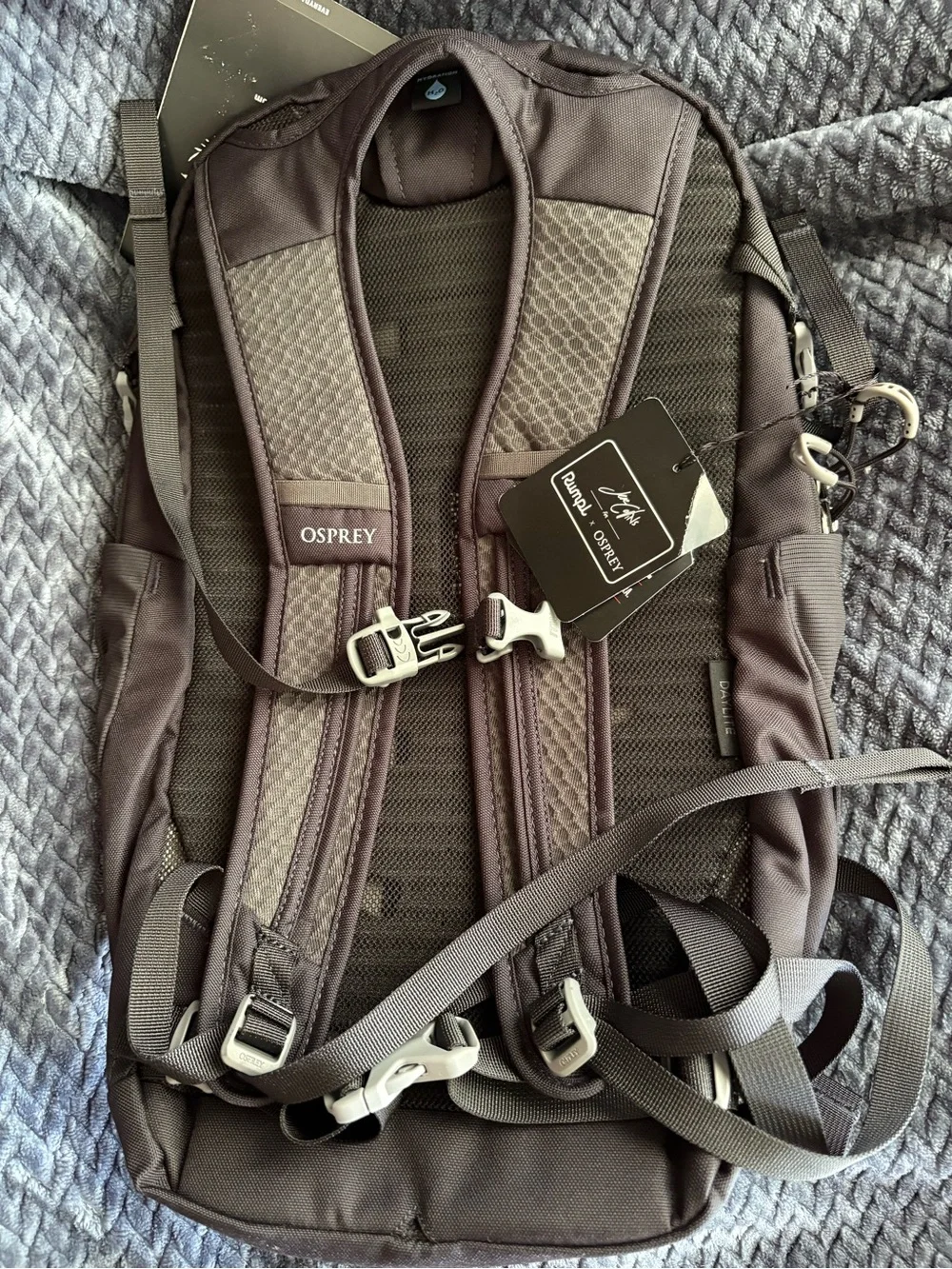 OSPREY Black Backpack with Earth-Tone Pattern and Turquoise Accents - Picture 3 of 4
